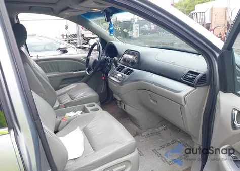 2010 Honda Odyssey Ex-L z USA, uszkodzony, nr VIN 5FNRL3H60AB085658